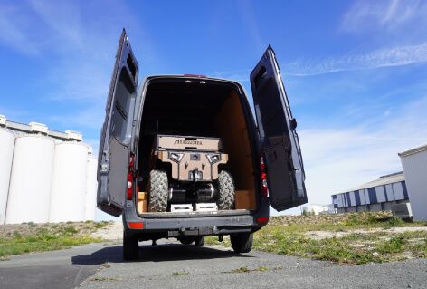 A rear view of the Crafter van, featuring the Barakuda loaded inside, highlighting its efficient loading design.