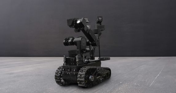 Atrax robot on display, showcasing collaboration with French Special Forces in demining missions