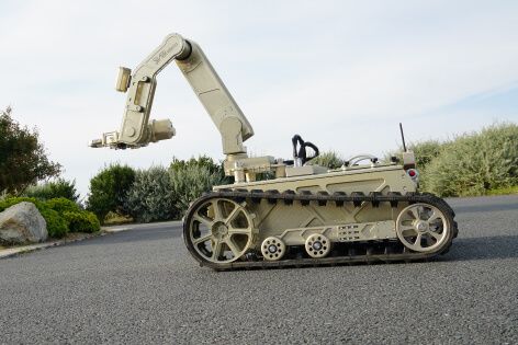 Rhyno EOD navigating parking terrain, showcasing its versatility across different operational environments.