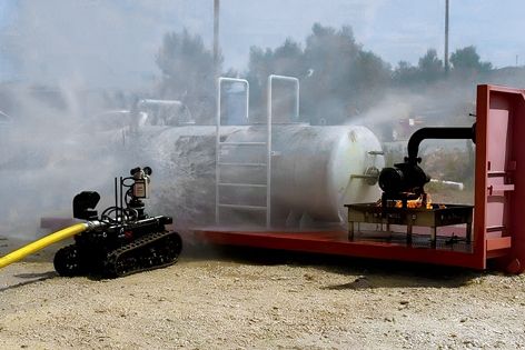 Rhyno Protect in action, continuously spraying water on a gas tank to control temperature and avoid escalation.