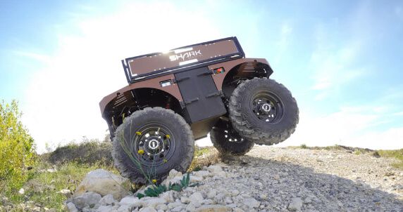 Barakuda robot climbing a steep incline, showing its stability and power.